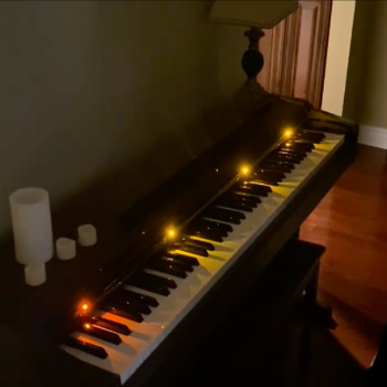 This is the final design of the non wearable circuit. The design is of a piano where when a user pulls the cover up, the circuit completes turning on lights to light up the keys.