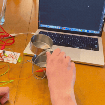This video shows how the two measuring cups interact when placed within each other. 